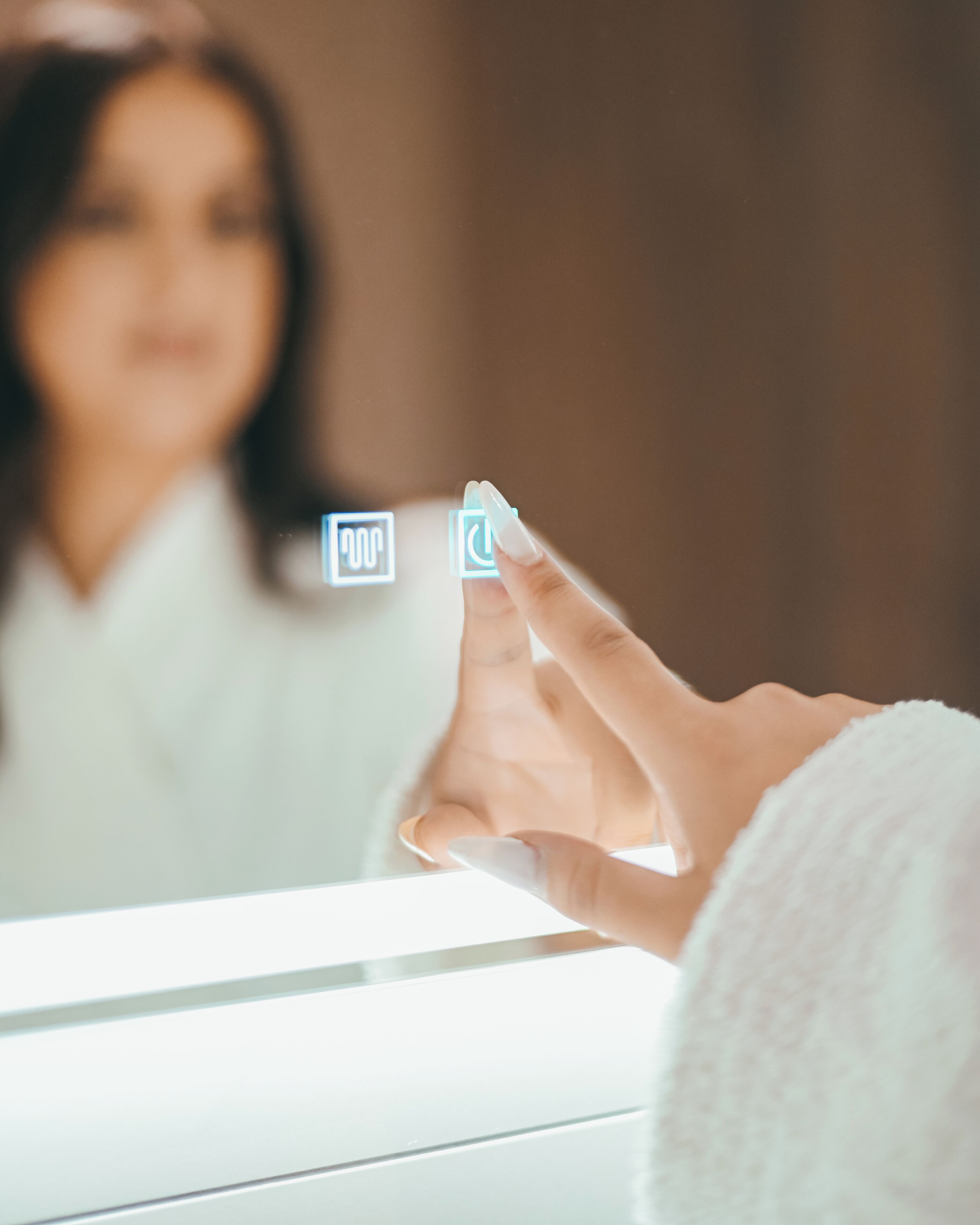 A hand interacting with a digital interface, possibly a control panel or a touchscreen device.