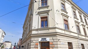 A multi-story building with a ground-floor shop named 'DUDU Concept Store'. - Kraków Comfort Loft Apartments by Rentujemy (Kraków)