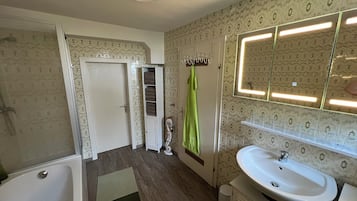 Shower, eco-friendly toiletries, hair dryer, towels