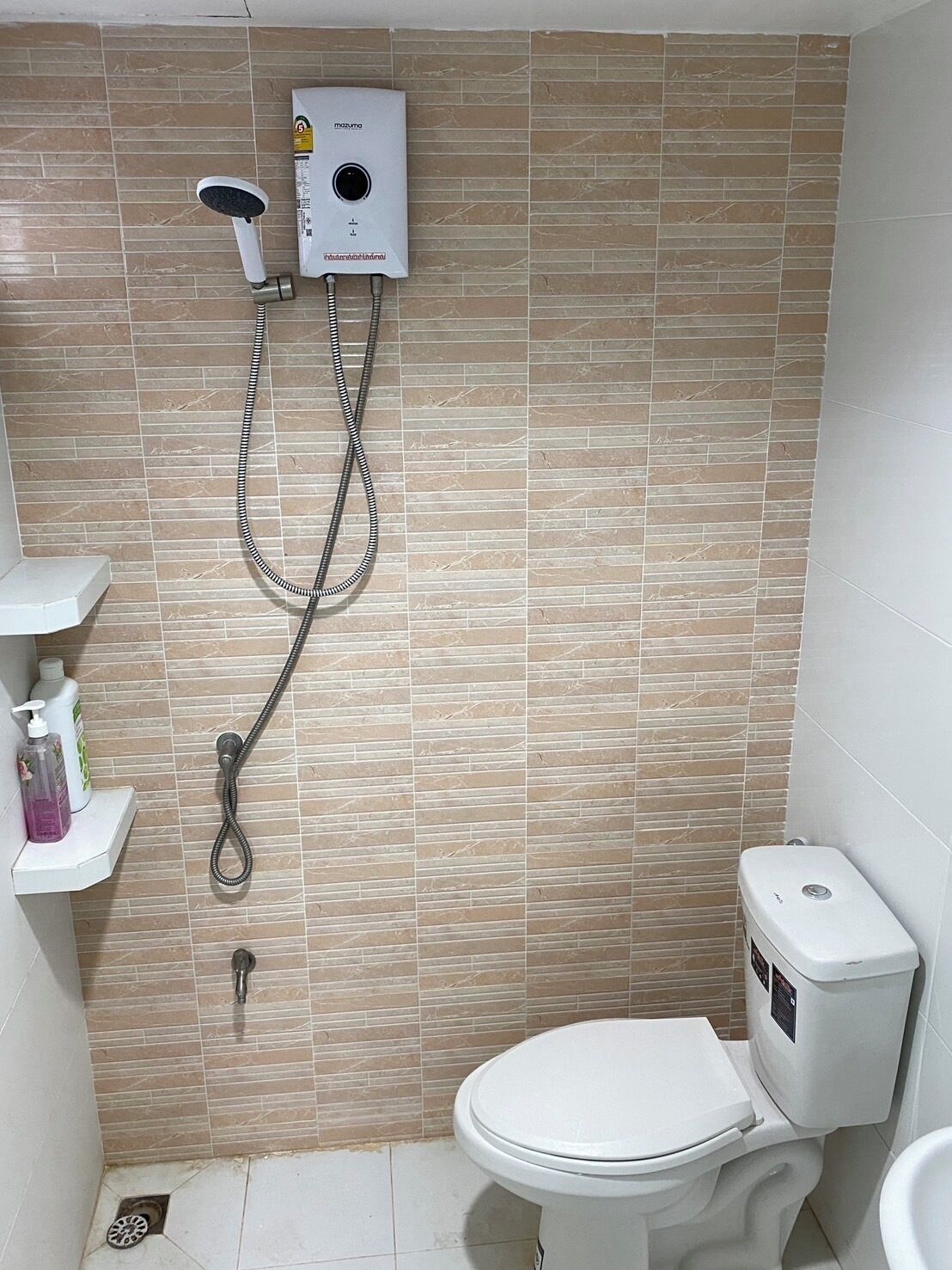 Shower, rainfall showerhead, hair dryer, towels