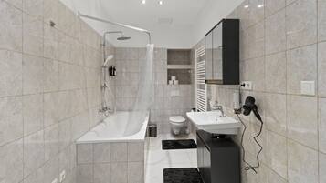 Hair dryer, towels, soap, toilet paper