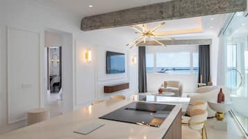 Deluxe Suite, 2 Bedrooms, Sea View | Living area | 40-inch Smart TV with satellite channels