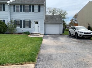 A two-story house with a garage, a driveway, and a parked SUV. - Located right at the center of Elizabethtown , Lancaster, York and Hershey park. (Elizabethtown)