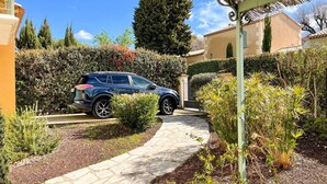 A paved garden path leading to a parked SUV. - Awesome home in Saint-Rémy-de-Provence (Saint-Rémy-de-Provence)