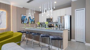 Fridge, microwave, oven, stovetop - Disney Retreat 4BR • Pool • Cars & Lion King (Kissimmee)