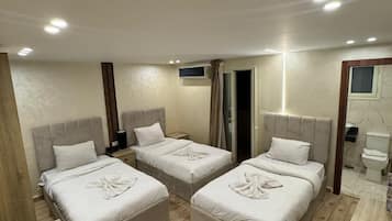 Ropa de cama de alta calidad, cubrecamas, minibar y wifi gratis