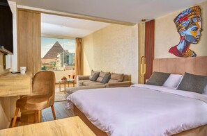 Luxe beddengoed, donsdekens, een minibar, gratis wifi