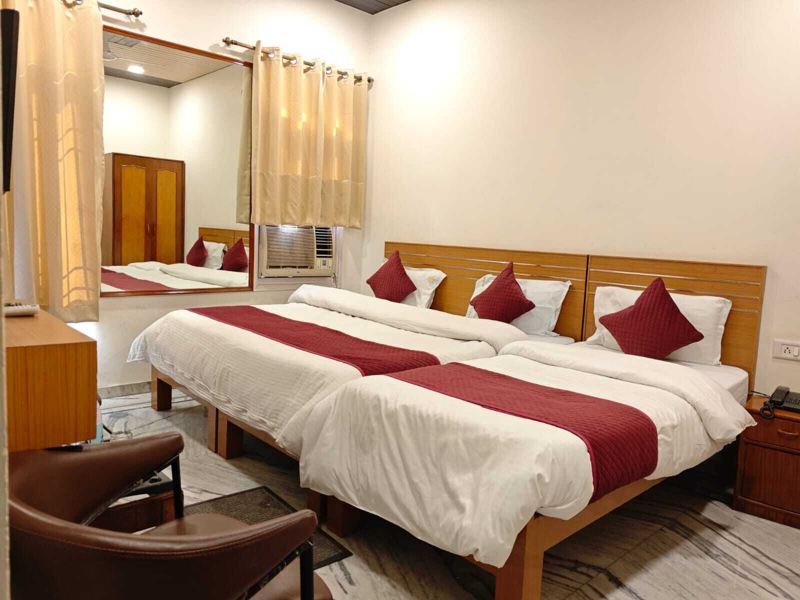 Family Triple Bed AC room | Blackout curtains, free WiFi, bed sheets