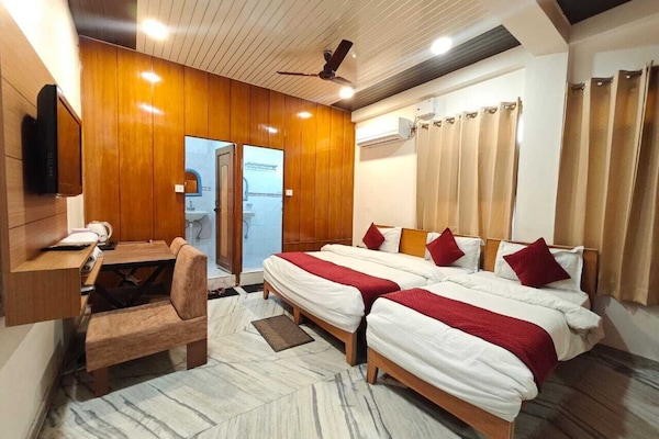 Family Triple Bed AC Room Double Bathroom | Blackout drapes, free WiFi, bed sheets