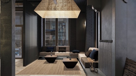 Área de estar no saguão. Palazzo Bellezia Luxury Suites & Spa