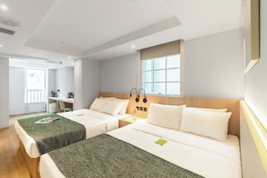 Deluxe Quadruple Room | In-room safe, desk, blackout drapes, free WiFi