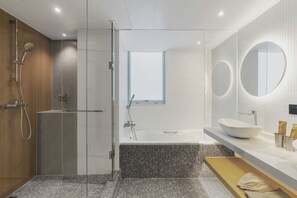 Deluxe Quadruple Room | Bathroom | Shower, hair dryer, slippers, towels - Urbanwood Hung Hom (Kowloon)