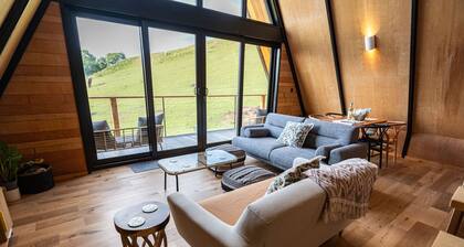 Stunning Scandinavian A Frame lodge with outside bathtub