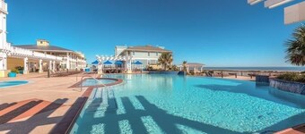 New to rentals at Pointe West. On the Sunset Pool/Lazy River and viewing WestBay