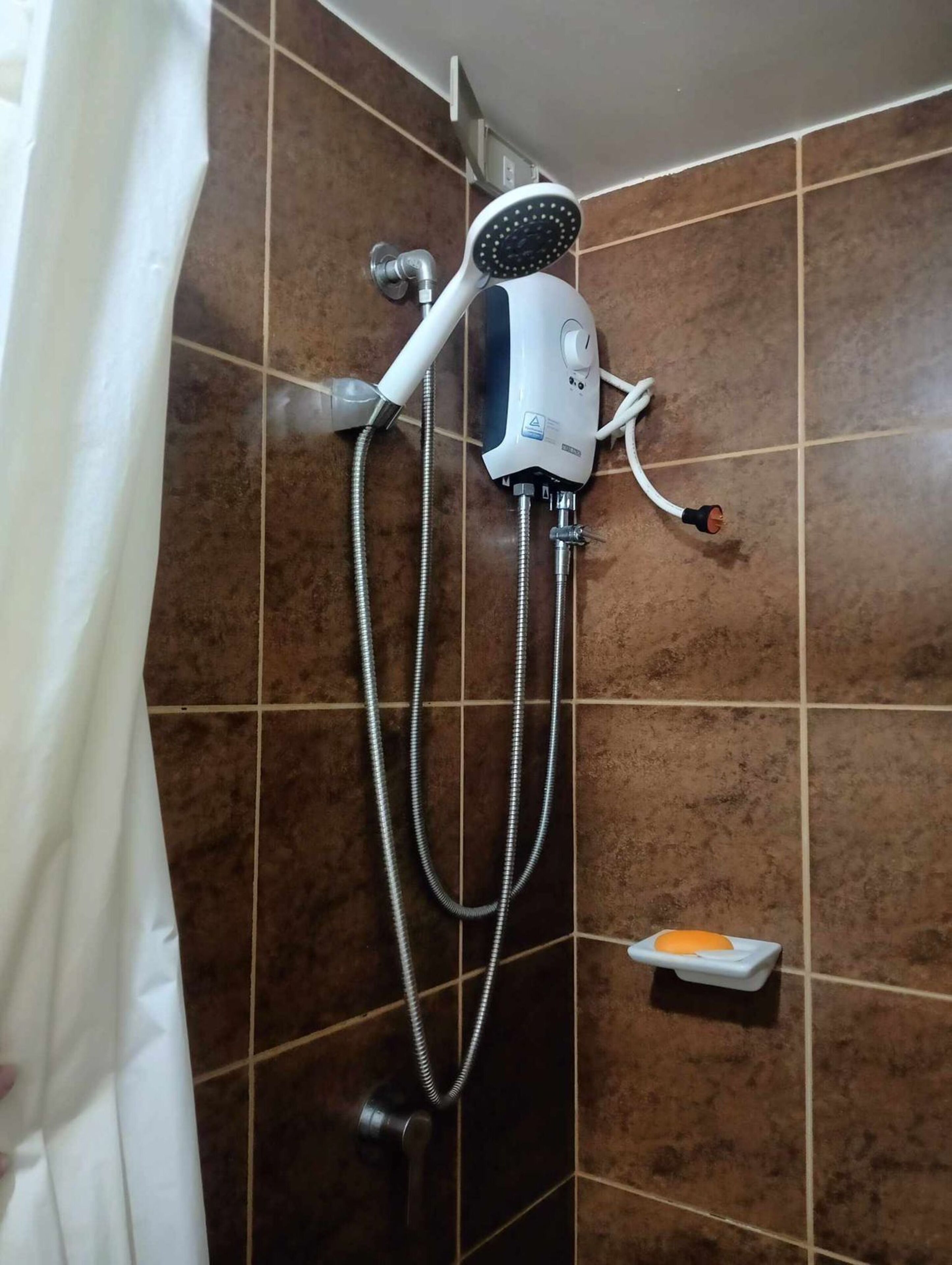 Standard Condo, 1 Bedroom, Kitchen, City View | Bathroom | Shower, bidet, towels