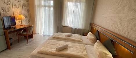 1 غرفة نوم ومكواة/لوح كي وواي فاي وملاءات أسرّة