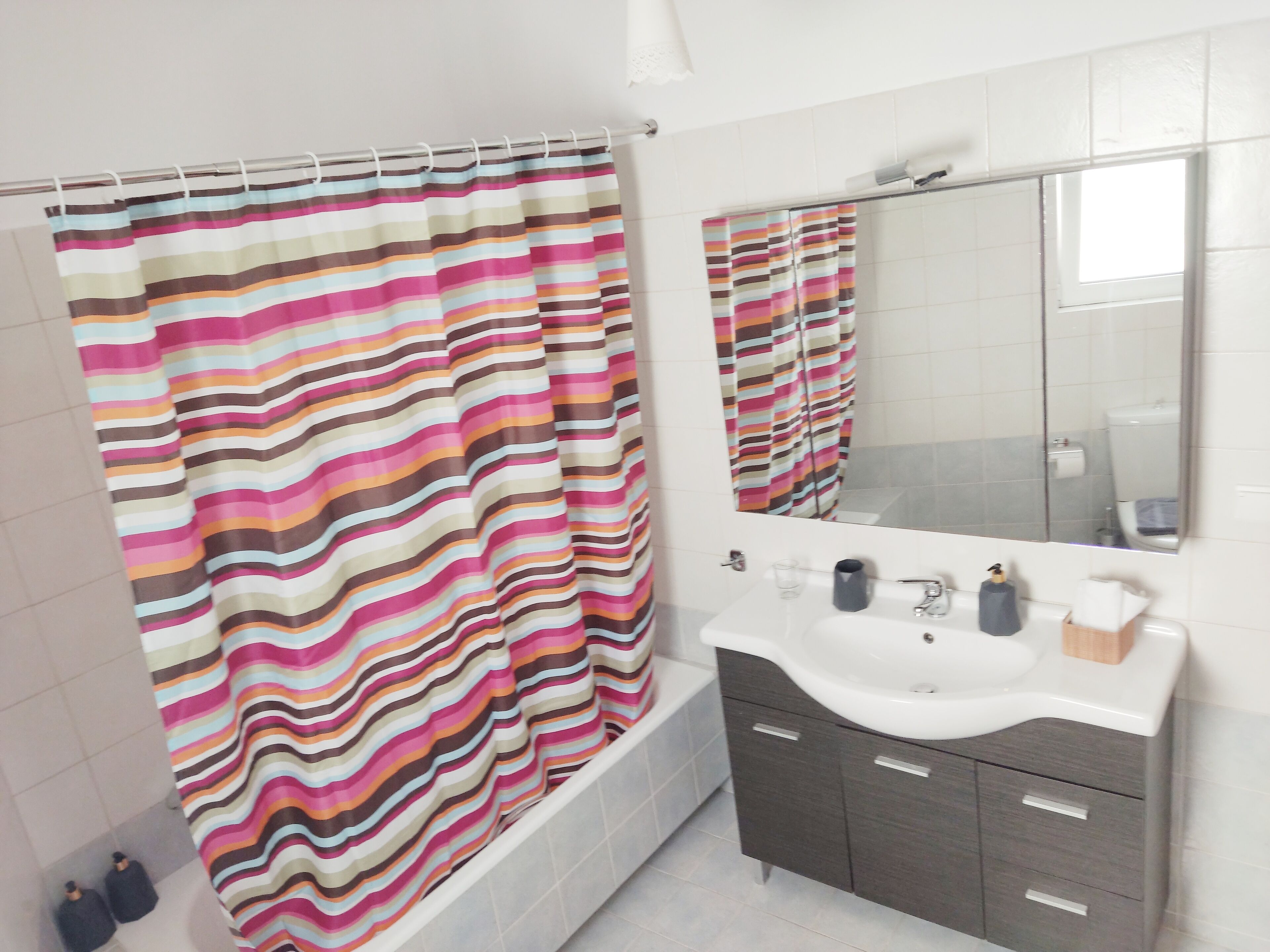Hair dryer, towels, soap, shampoo
