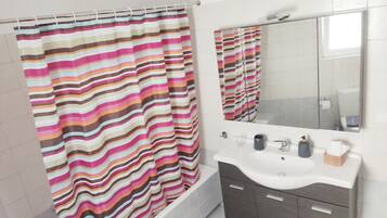 Hair dryer, towels, soap, shampoo