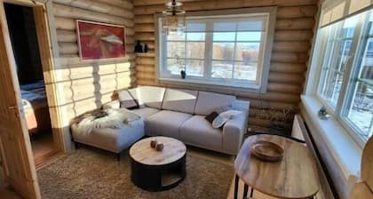 Family Log House in the rural North Iceland. Brand new with a stunning view.