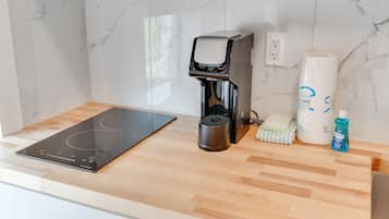 Fridge, microwave, stovetop, coffee/tea maker