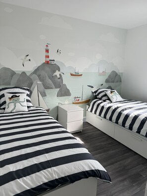 3 bedrooms, desk, iron/ironing board, travel cot