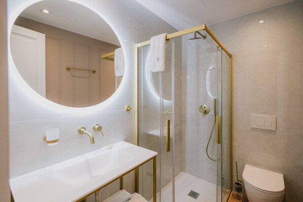 Hair dryer, towels, soap, toilet paper