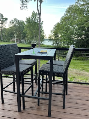 Outdoor dining - Birds Nest is a beautiful newly built home on Swanlake with 88 ft  of deck!!  (Belfast)