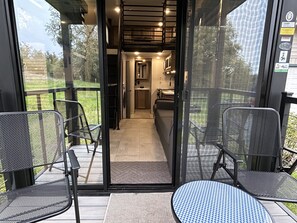 Outdoor dining - New tiny house near Grass Valley on shared 5 acre wooded lot! Hot tub access! (Rough and Ready)