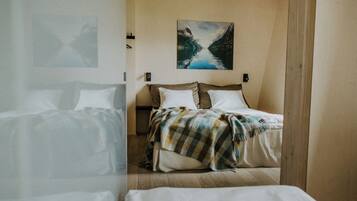 Family Quadruple Room, Multiple Beds, Private Bathroom, Sea Facing | Free WiFi, bed sheets