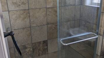 Shower, towels, soap, shampoo