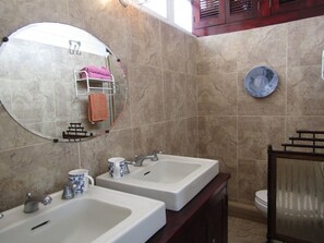 Shower, towels, soap, toilet paper