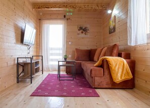 Living area - Orange Slice 1-BDR Apartment (Žabljak)