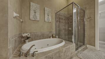 Jetted tub, hair dryer, towels