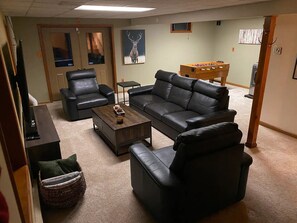 Smart TV, fireplace, video games, foosball