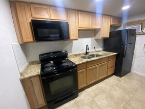 Fridge, microwave, oven, stovetop - Backyard Escape 2
(Tampa)