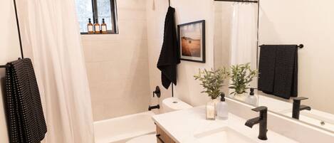 Hair dryer, towels, soap, shampoo