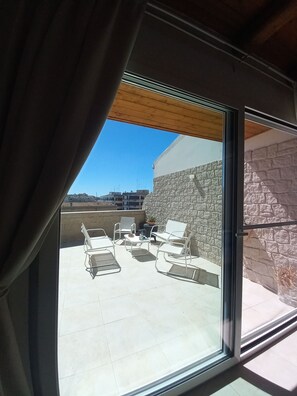 Interior - Penthouse with terrace, sea front overlooking Ortigia and its monuments.  (Siracusa)