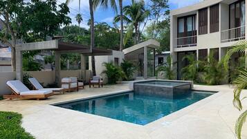 Outdoor pool, open 8:00 AM to 10:00 PM, pool umbrellas, pool loungers