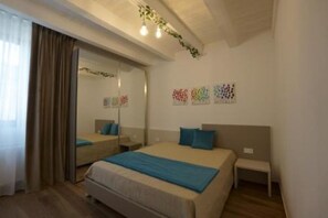 2 dormitorios, tabla de planchar con plancha, wifi y ropa de cama