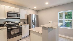 House, 2 Queen Beds, Kitchen, Garden View (Duplex on Howard- Hornsby Suite) | Private kitchen | Fridge, microwave, oven, stovetop - Cozy 2br/1ba Duplex Just Blocks From Downtown Biloxi, Beaches and Entertainment (Biloxi)