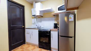Family Cabin, 2 Bedrooms | Private kitchen | Full-size fridge, microwave, oven, electric kettle
