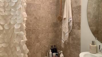 Hair dryer, towels, soap, shampoo