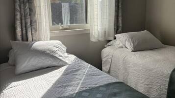 2 bedrooms, desk, iron/ironing board, travel cot