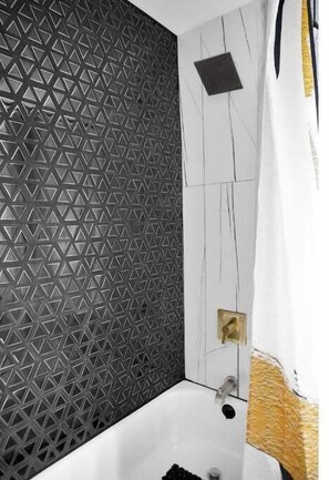 Shower, towels, soap, toilet paper