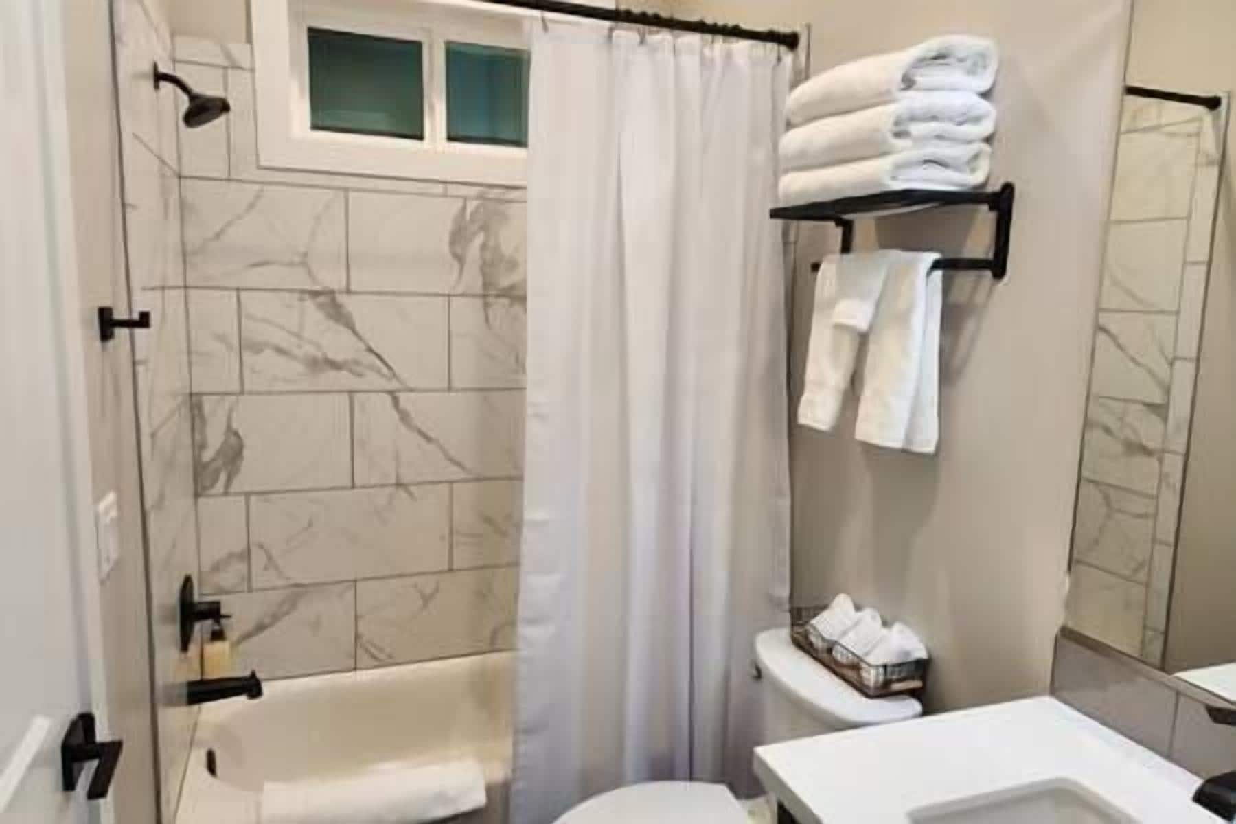 Hair dryer, towels, soap, shampoo