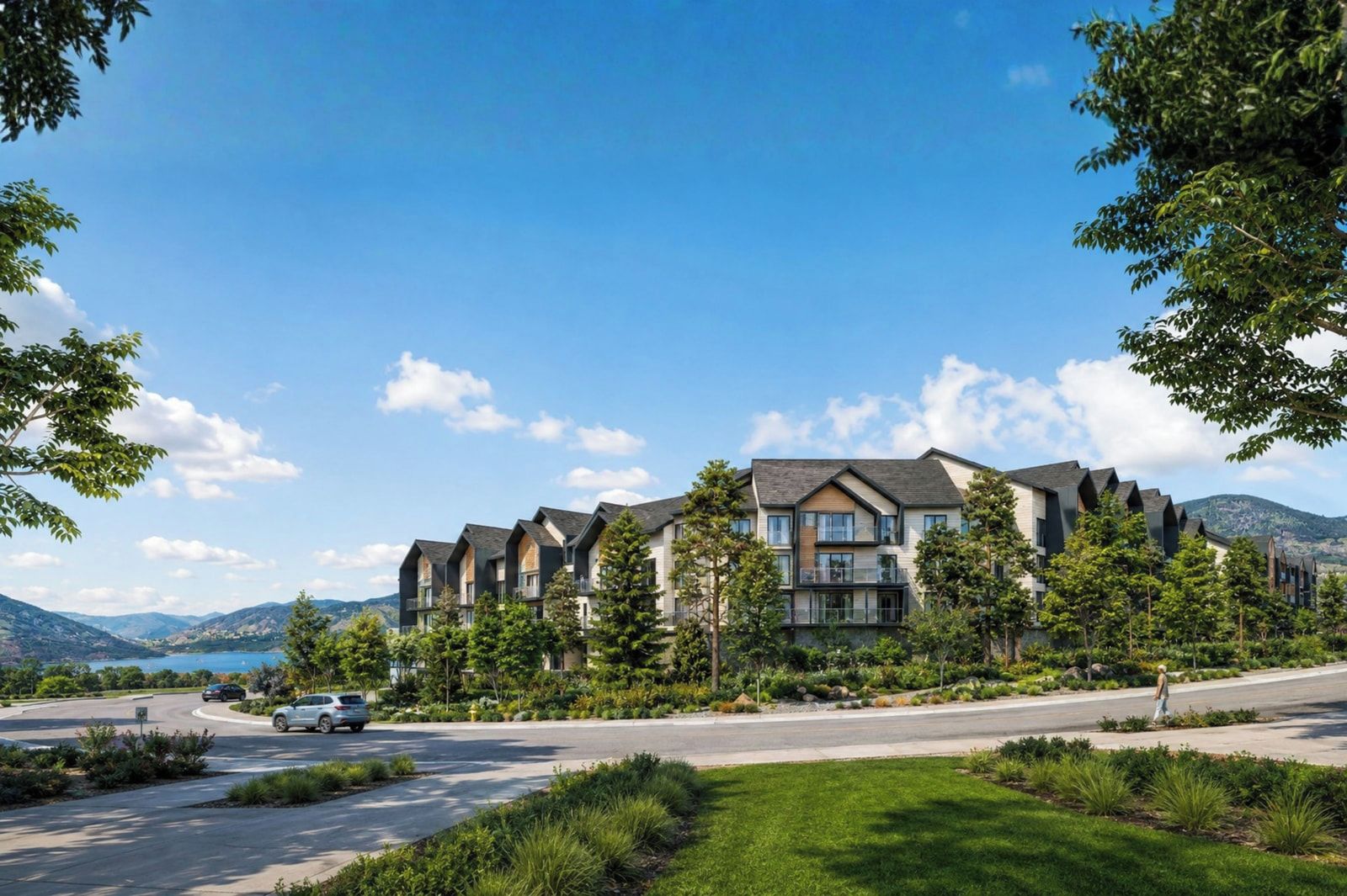 A multi-story residential building with a modern architectural design, surrounded by lush greenery and a clear blue sky.