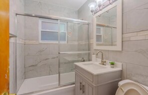 Hair dryer, towels, soap, toilet paper