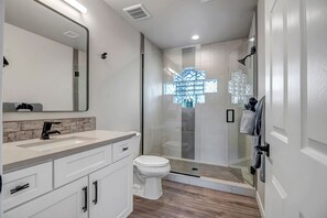 Shower, hair dryer, towels