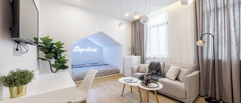 Quarto casal com design assinado | Edredons de pluma, Wi-Fi de cortesia