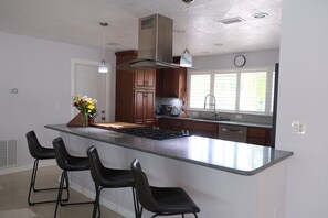 Fridge, microwave, oven, stovetop - Spacious, Modern 3x2 House at Indian Rocks Beach with a Heated Salt Pool! (Seminole)